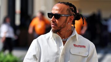 Hamilton launches Ferrari bid to match F1's most unique champion